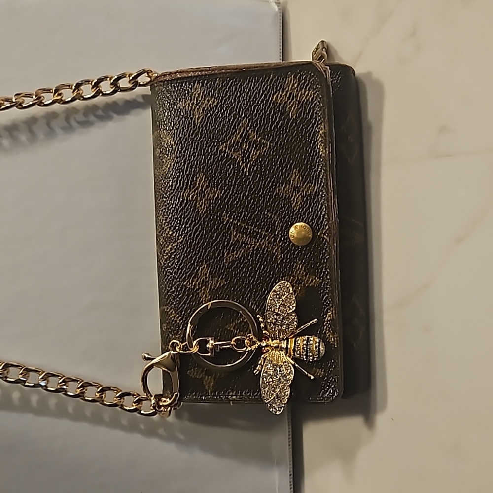 Louis vuitton LV medium wallet with off-brand converter chain and keychain